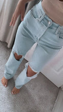 Load and play video in Gallery viewer, Light Denim Slash High Rise Jeans
